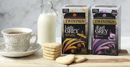 Boxes of Twinings Earl Grey and Lady Grey sitting side by side on a table